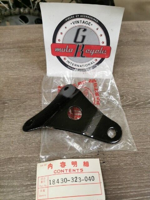 NOS HONDA CB500 BRACKET HOLDER EXHAUST MUFFLER LOWER LEFT SIDE 18430-323-040 H81